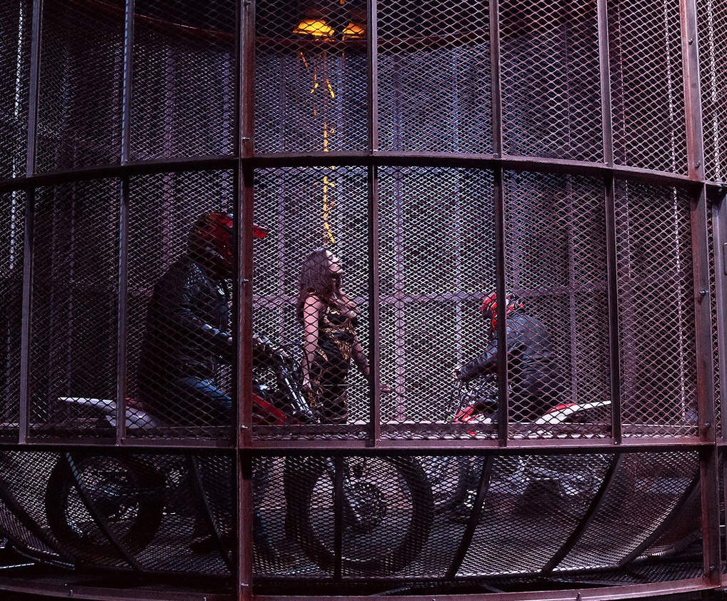 Cage of Death motorcycle stunt show with thrilling performances